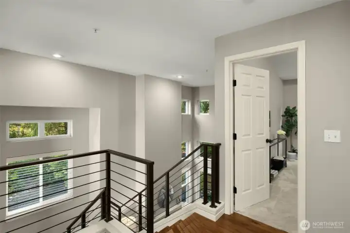 Wrought iron railing and rich hardwoods