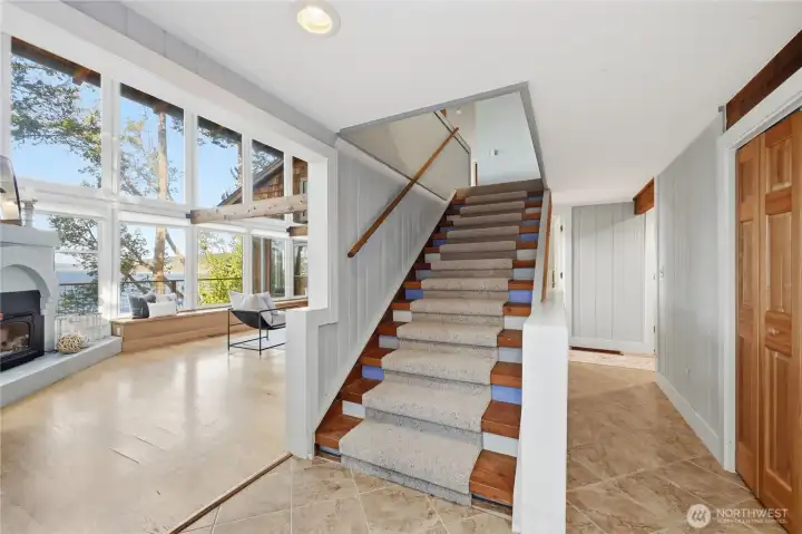 Staircase up to main bedroom suite.