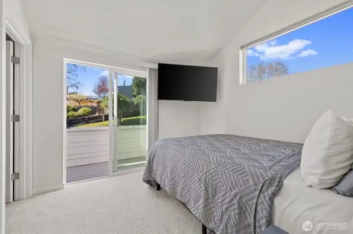 Primary Bedroom with ensuite bathroom and a balcony.