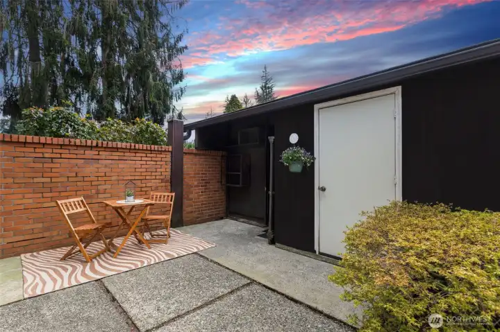 private back pation with direct access to private 2-car garage + storage