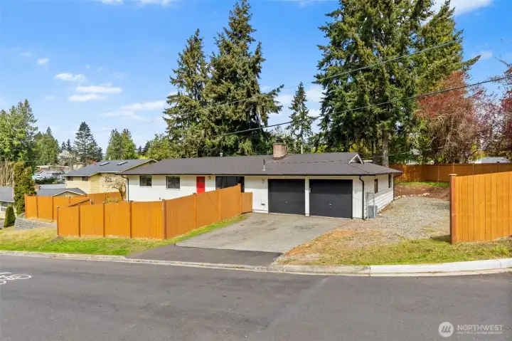 Large RV or boat parking on right side of the home