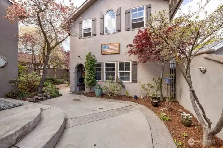 BACK PATIO STEPS TO BACKYARD AND GARAGE WITH STUDIO ABOVE