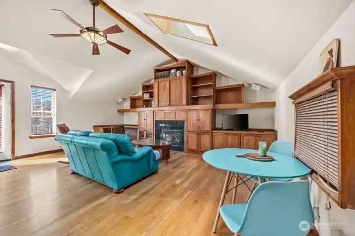 STUDIO WITH FIREPLACE AND BUILTIN CHERRY CABINETS