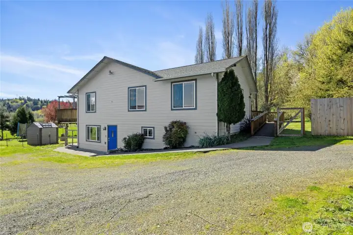North side of home shows the spacious lower level.