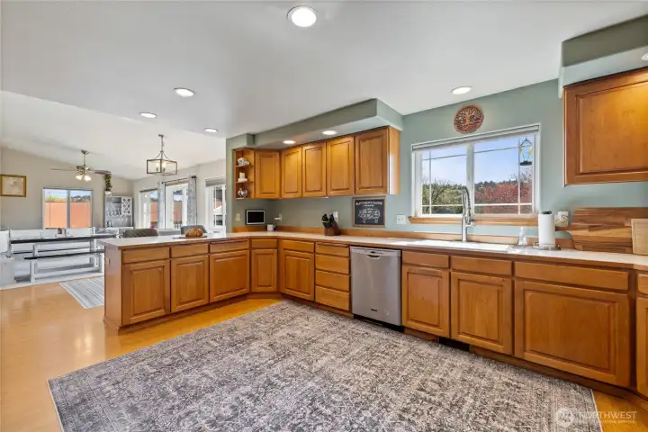Roomy kitchen with ample cabinetry and storage.