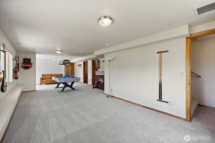 Updated lower level provides generous creative and recreational space.