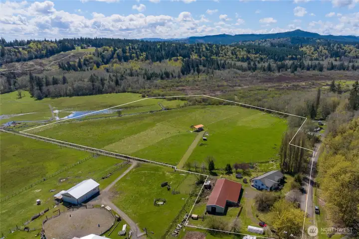 Territorial view shows property's 18+ acres in relation to the home and outbuildings.