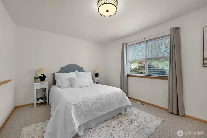 Primary bedroom with walk in closet and ensuite full bath