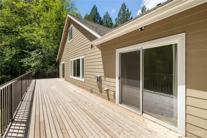 Access New Deck from Both Primary Bedroom and Dining Room Access New Deck from Both Primary Bedroom and Dining Room