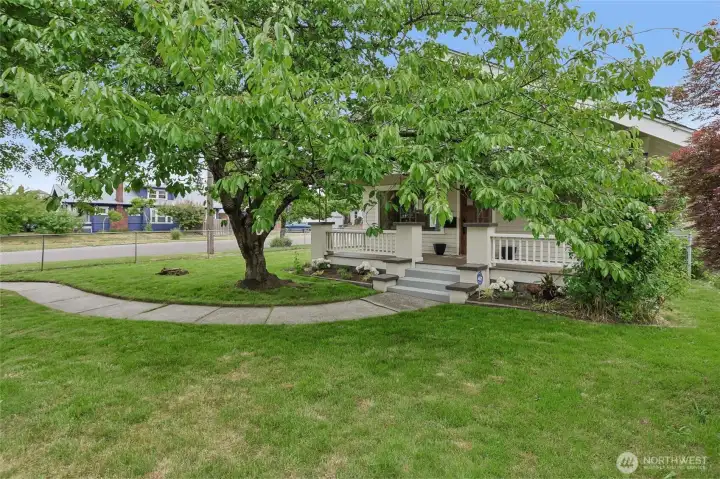 Surrounded by lush landscaping and colorful seasonal blooms, the entrance presents a welcoming and cheerful first impression. The fully fenced yard encircles the property, ensuring privacy and security while creating a perfect environment for outdoor living, pets, or gardening activities. Surrounded by lush landscaping and colorful seasonal blooms, the entrance presents a welcoming and cheerful first impression. The fully fenced yard encircles the property, ensuring privacy and security while creating a perfect environment for outdoor living, pets, or gardening activities.