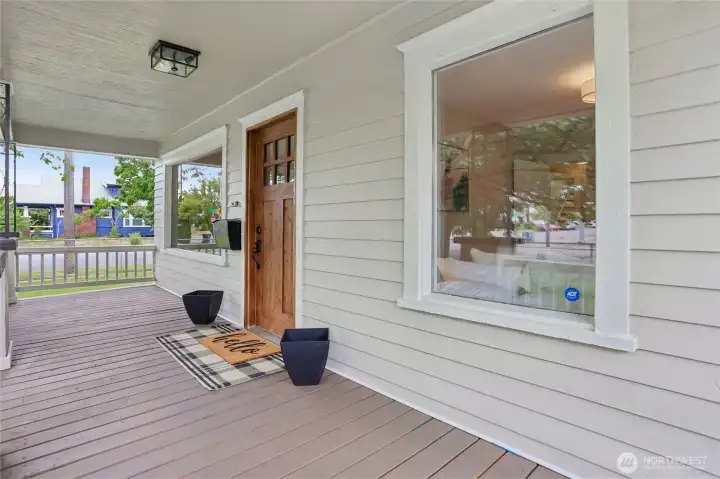 A newly installed, exquisitely stained wooden front door makes a stunning first impression—warm, rich, and inviting. It provides a greeting that immediately conjures a feeling of home. A newly installed, exquisitely stained wooden front door makes a stunning first impression—warm, rich, and inviting. It provides a greeting that immediately conjures a feeling of home.
