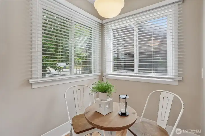 A delightful breakfast nook bathed in natural light provides an ideal setting for enjoying your morning coffee or casual meals. It’s a private and cozy space, thoughtfully designed for those tranquil moments. A delightful breakfast nook bathed in natural light provides an ideal setting for enjoying your morning coffee or casual meals. It’s a private and cozy space, thoughtfully designed for those tranquil moments.