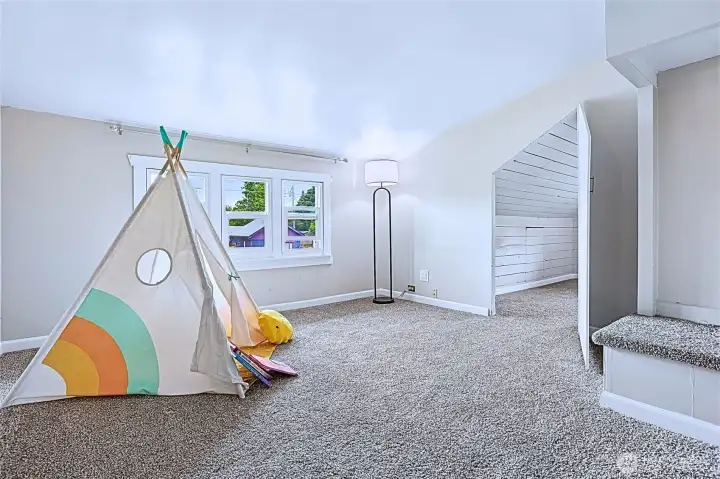 A bright and versatile attic room with fresh paint, new plush carpeting, and abundant natural light—perfect for a bedroom, playroom, or cozy retreat. A bright and versatile attic room with fresh paint, new plush carpeting, and abundant natural light—perfect for a bedroom, playroom, or cozy retreat.