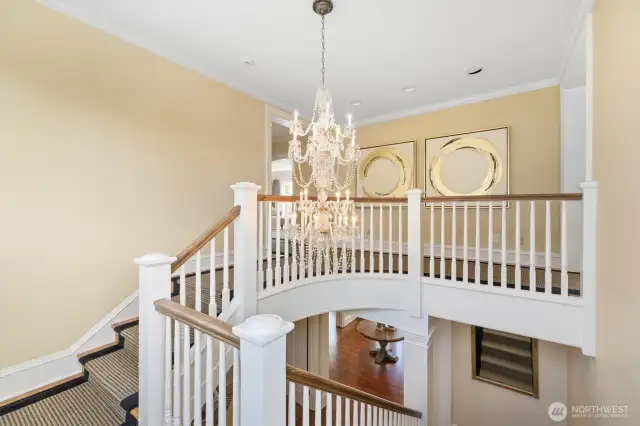 This grand staircase is one of two staircases servicing the second floor. You cannot appreciate the high ceilings or impressive spaces until you experience it in person.