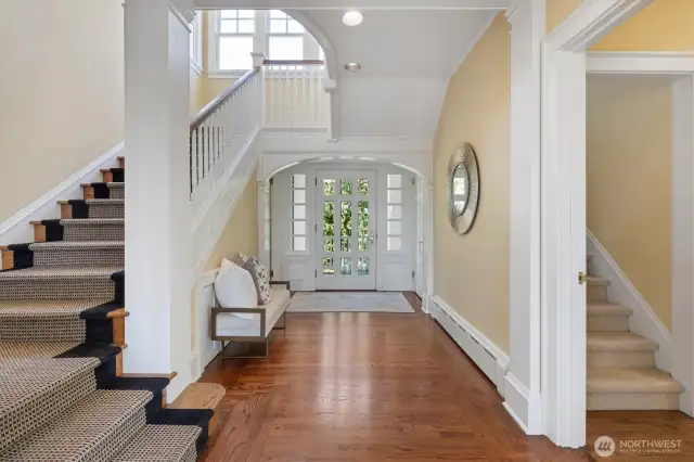 The grand entry way looks to both the original front door and the modern day front door.