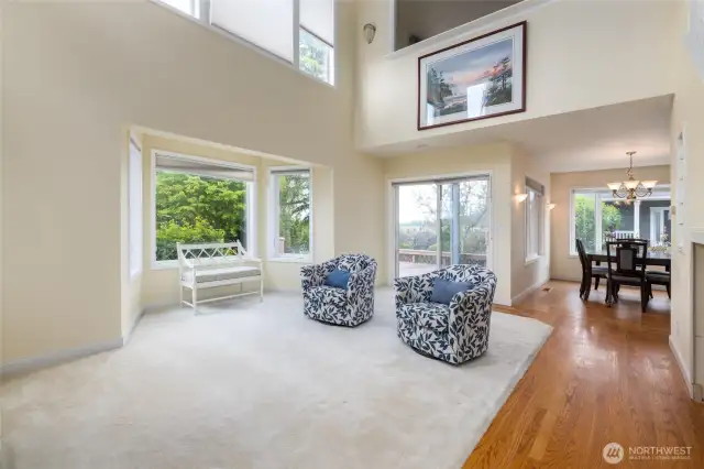 Spacious living room with quality carpet and large windows for loads of natural light.