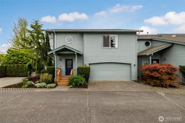 Two car garage plus extra outdoor parking.