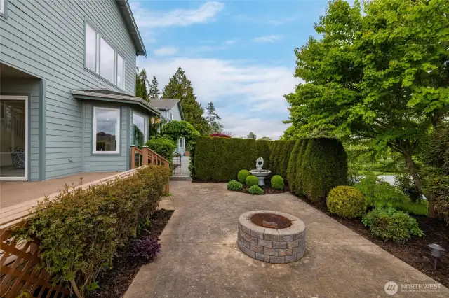 Back deck and patio with a firepit.