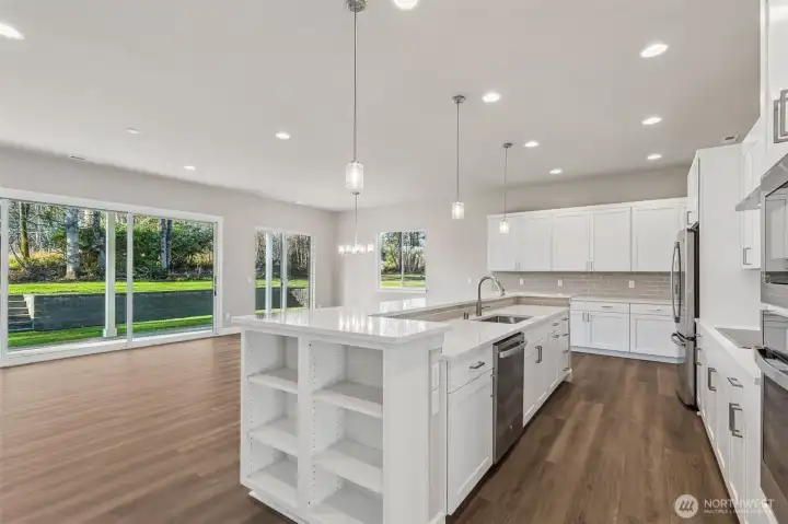 Photos are of another Harris plan- finishes will vary.