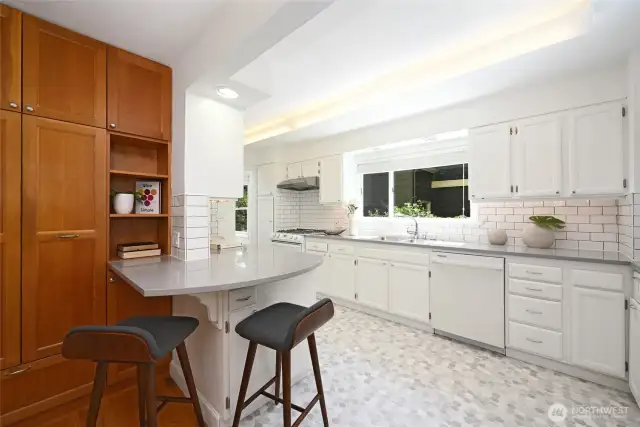 These thoughtful custom pull out pantry cabinets hold a tremendous amount of whatever needs to be stored.