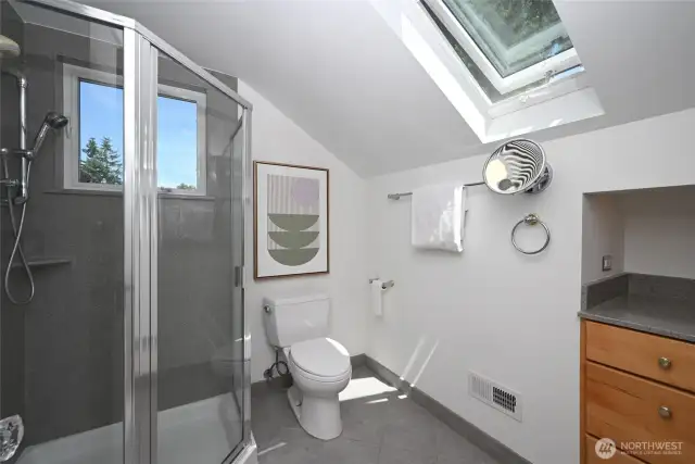 Upstairs three-quarter bath with heated floors