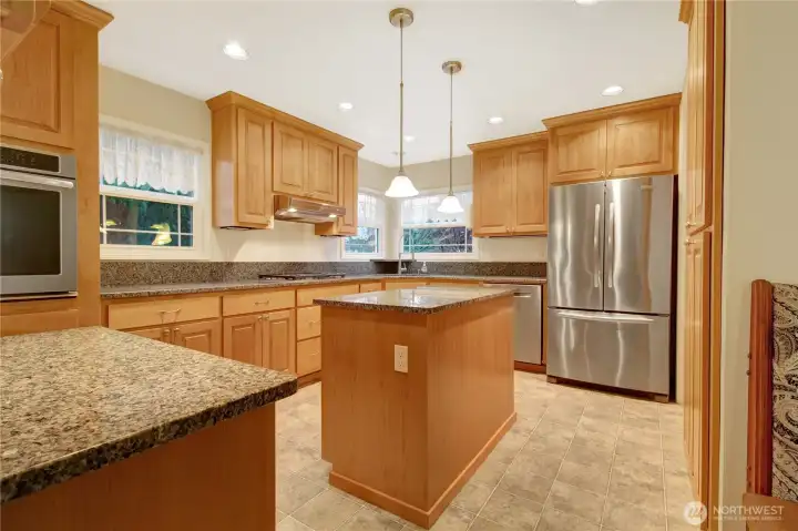 Upper updated kitchen, tons of lighting. pull out, pantry and more!