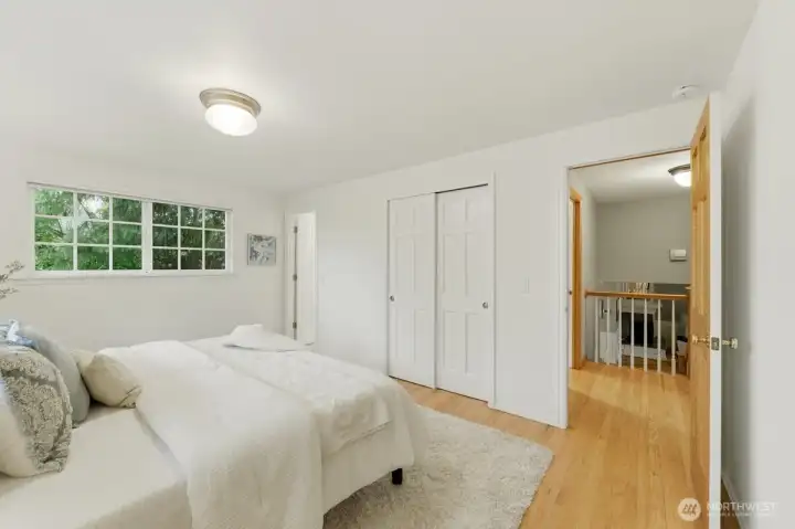 The primary bedroom includes an en-suite bathroom, two generous closets and is ideally located on the same level as two additional bedrooms.