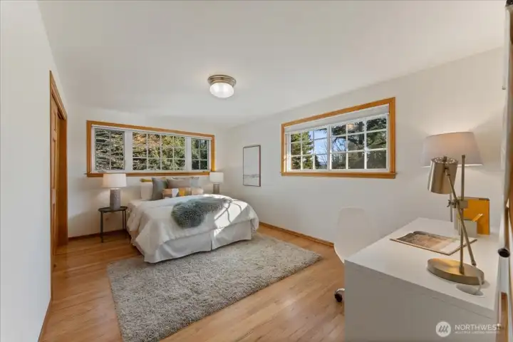 Generously sized second bedroom with the same airy, light-filled feel.