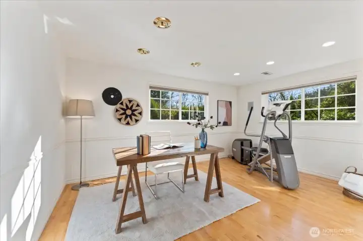 Lower-level office provides generous space for work or exercise and can double as a fourth bedroom. With a nearby third bathroom and separate exterior entry, it’s perfect for guests or a MIL suite.