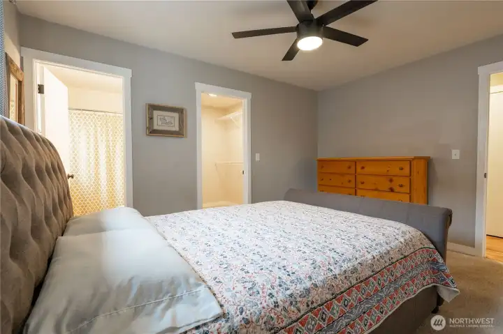 Primary Bedroom with attached bathroom and walk-in closet.