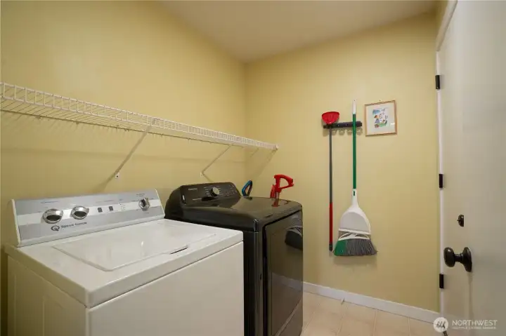 Utility Room with door leading to Garage.