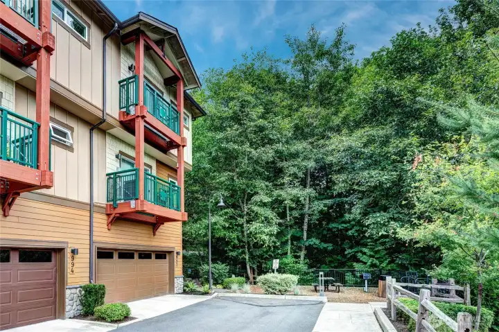 Backside of Home, showing garage and proximity to greenbelt