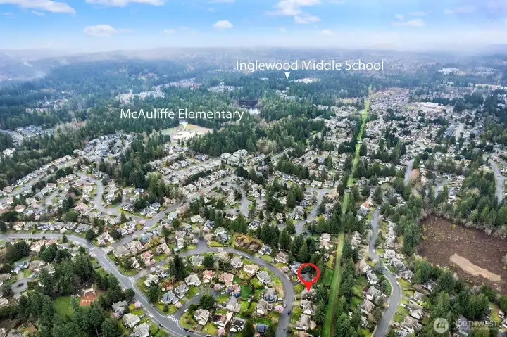 The greenbelt path located behind the home makes the 8 minute walk to McAuliffe Elementary super easy!