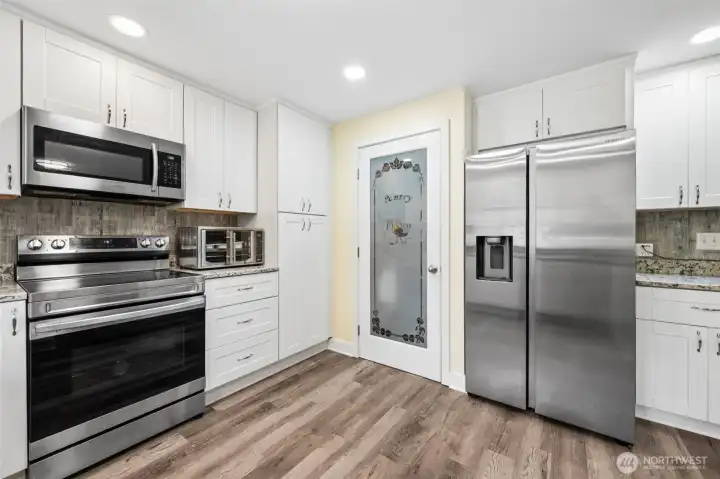 Remodeled kitchen with pantry and all stainless steel appliances included.
