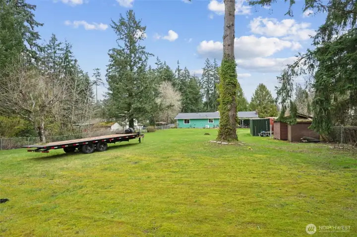Spacious backyard with room for gardening, play, pets, or future project!