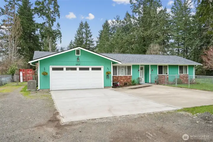 Ample parking with space for RV, trailer or multiple vehicles.