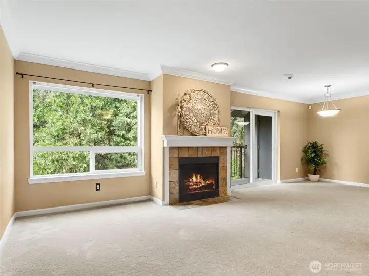 Light and bright living space overlooking a peaceful greenbelt for added privacy.