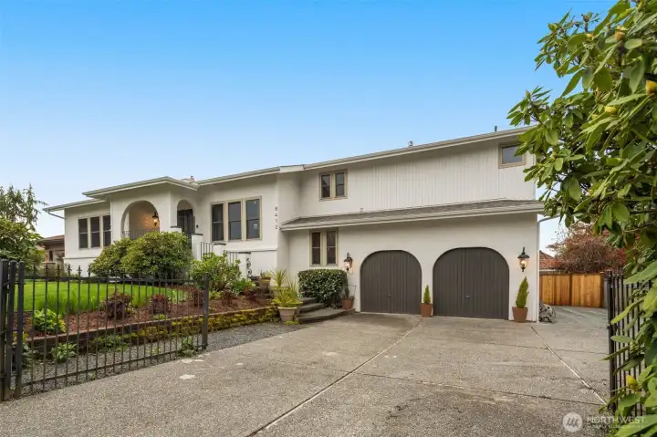 Oversized two car garage, side yard RV parking, driveway and off street parking.