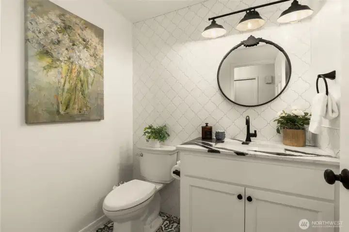 Custom memorable finishes. 1/2 bath for your guests.