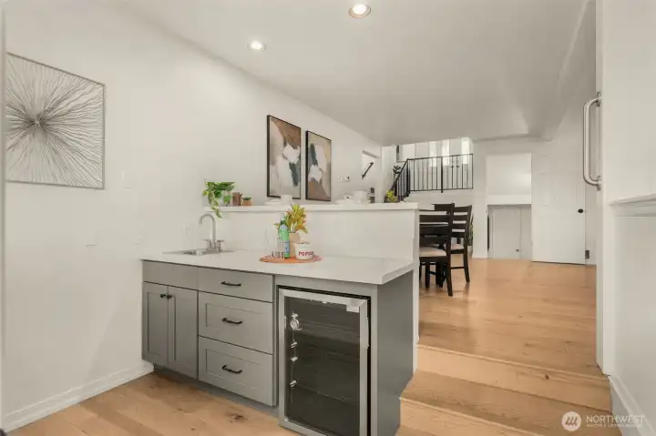 Wet bar for your gatherings! Deck access from this space.