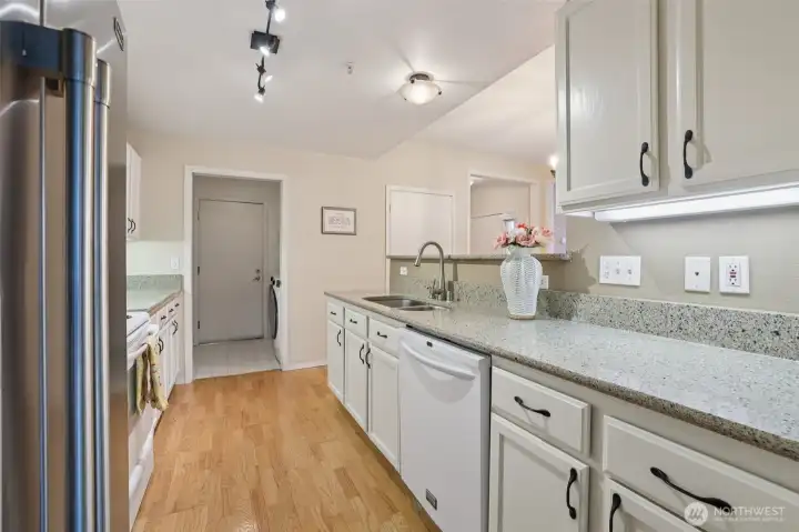 Pantry is straight ahead with a side by side washer and driver