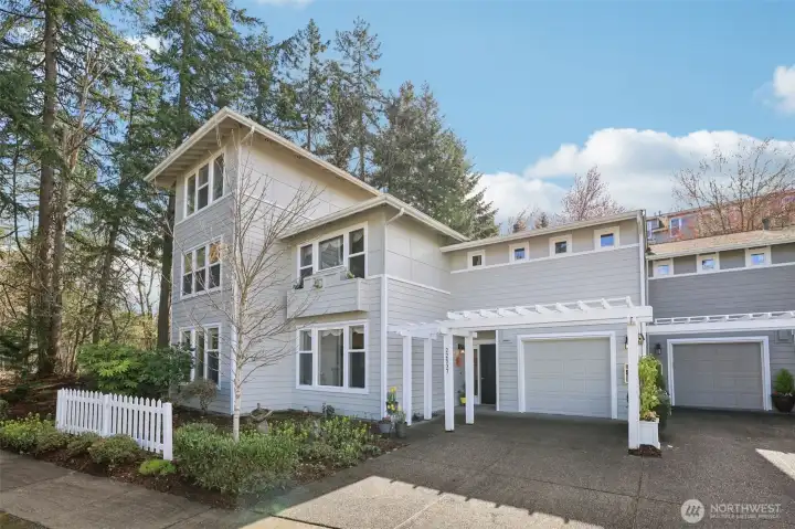 Single Car garage and driveway.  Lower corner single level condo.