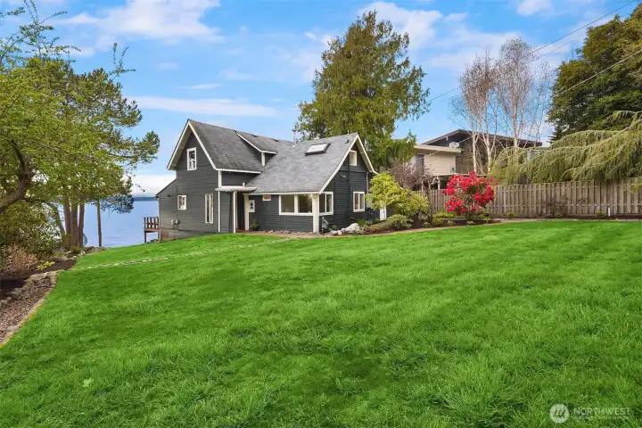 Unusually large flat yard to to expand the house or just enjoy.