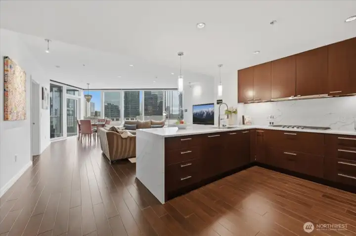 Quartz slab countertops and solid wood cabinets