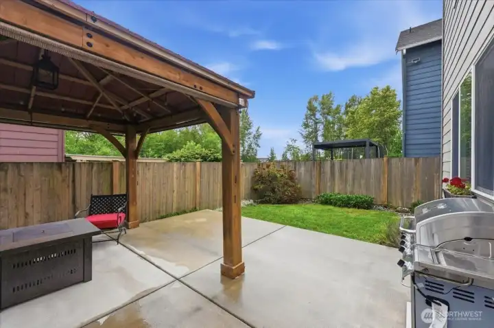 You'll love this extended patio with gazebo and fully fenced yard