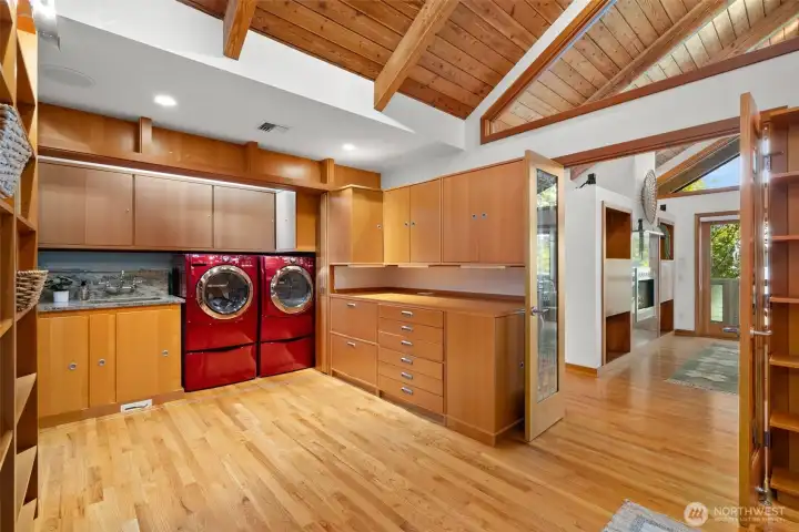 Easily accessible Laundry, can be closed off with pocket doors.