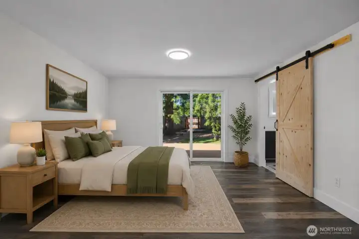 Photo digitally staged. Primary bedroom.