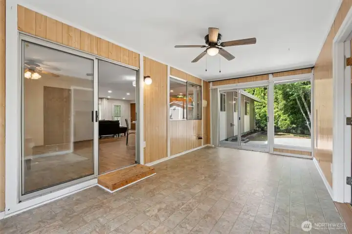 A versatile sunroom with its own private entrance and plumbing creates endless possibilities, whether you're envisioning a home-based business, art studio, fitness room, or additional living area