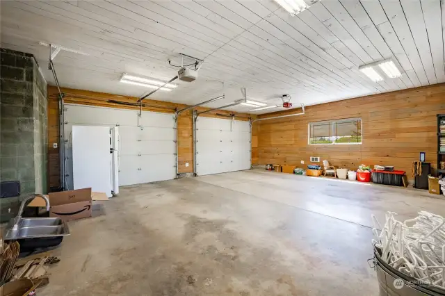 Extra-large garage is fully insulated with nice wood finishes.