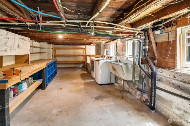Unfinished basement ideal for storage.